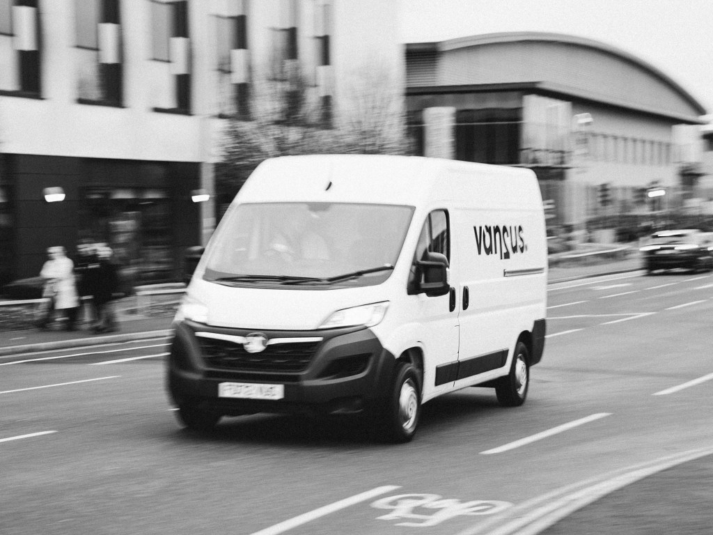 VAN2US VAN DRIVING IN AN INDUSTRIAL ESTATE